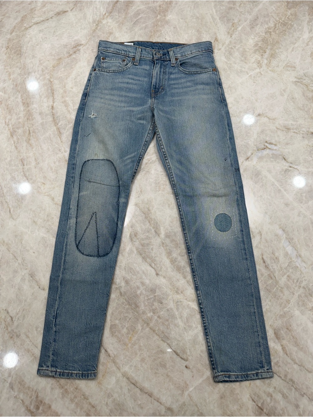 Levi's Distressed Light Blue Slim Straight Jeans with Patchwork